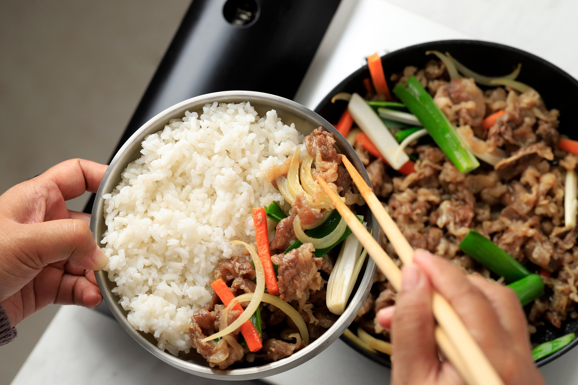 Plating Fresh Cooked Korean Beef Bulgogi witth Vegetable